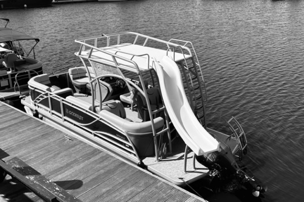 a wooden boat in a body of water