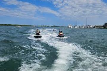 a group of people in a body of water