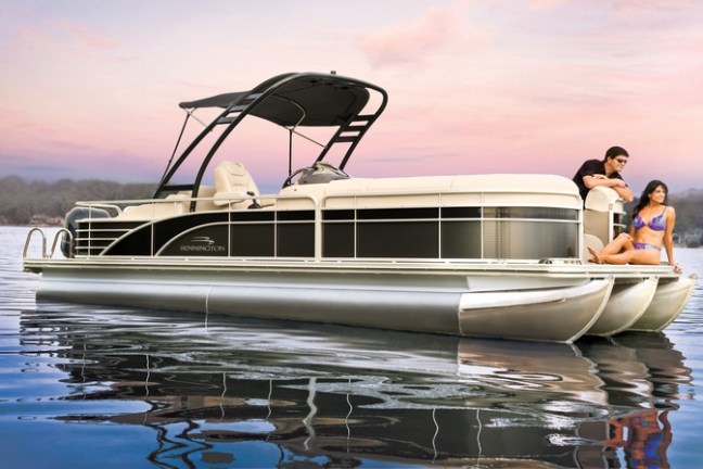 a man in a boat on a body of water