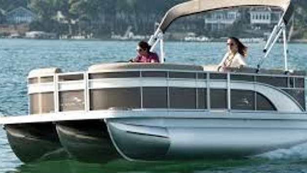 a small boat in a body of water